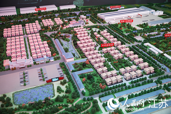 Foto ini menunjukkan model paparan rancangan pembangunan pekan Jiangxiang. (foto: Yang Wenquan/People.cn) 